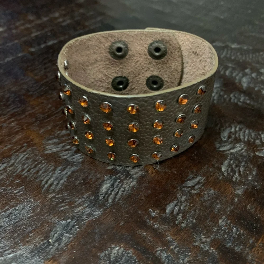 Brown leather cuff bracelet with brown rhinestones